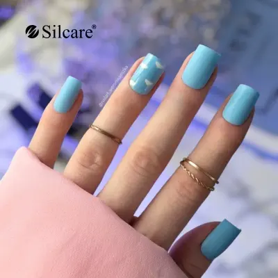Sky blue manicure with clouds – light, dreamy and full of charm