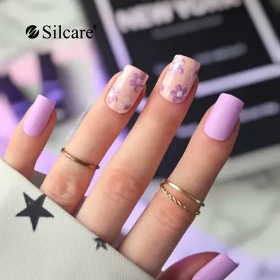Purple nails with floral design