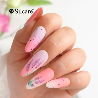 Spring freshness – nails in blue shades with floral accents