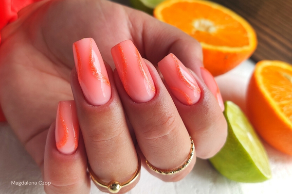 Neon orange nails - a hit for spring 2025!