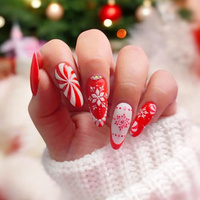 Peppermint-Nägel - ein süßes, festliches Nageldesign im rot-weißen Stil