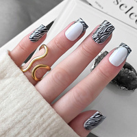 Zebra manicure - modern French with an animal twist