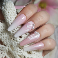 Bridal manicure with pearls - elegance in its purest form