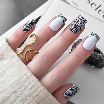 Zebra manicure - modern French with an animal twist