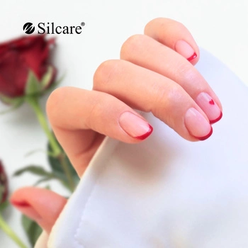 Delicate French with a red accent - the perfect Valentine's manicure