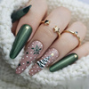 Winter green and beige nails - natural elegance with a festive touch