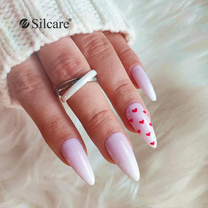 Subtle white hybrid nails with red hearts