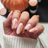 Pumpkin-themed nails - the perfect autumn manicure