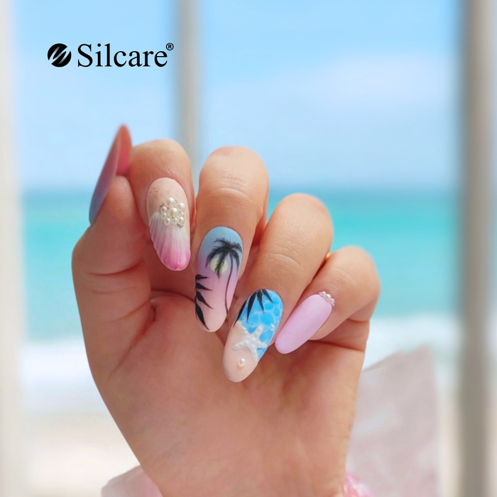 Paznokcie wakacyjne - idealna stylizacja na lato z palmami, muszelkami i perełkami