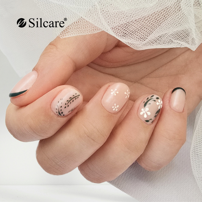 Beige nails with green accents