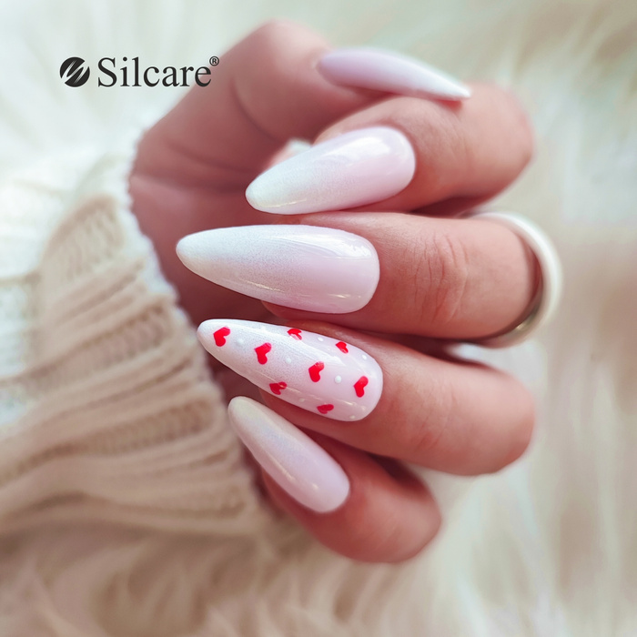 Subtle white hybrid nails with red hearts