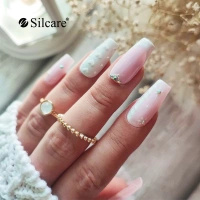 Manicure con strass - Lucentezza discreta ed eleganza in tonalità pastello