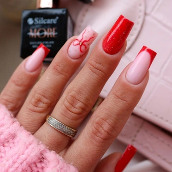 Świąteczny manicure z kokardką - elegancja w wyjątkowym, prezentowym stylu