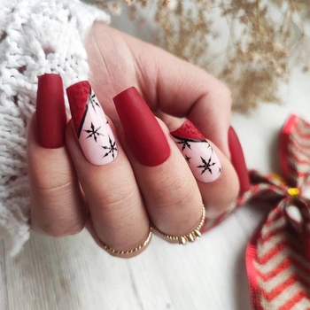 Winter nails - elegancka zimowa stylizacja w czerwieni i śnieżnych detalach